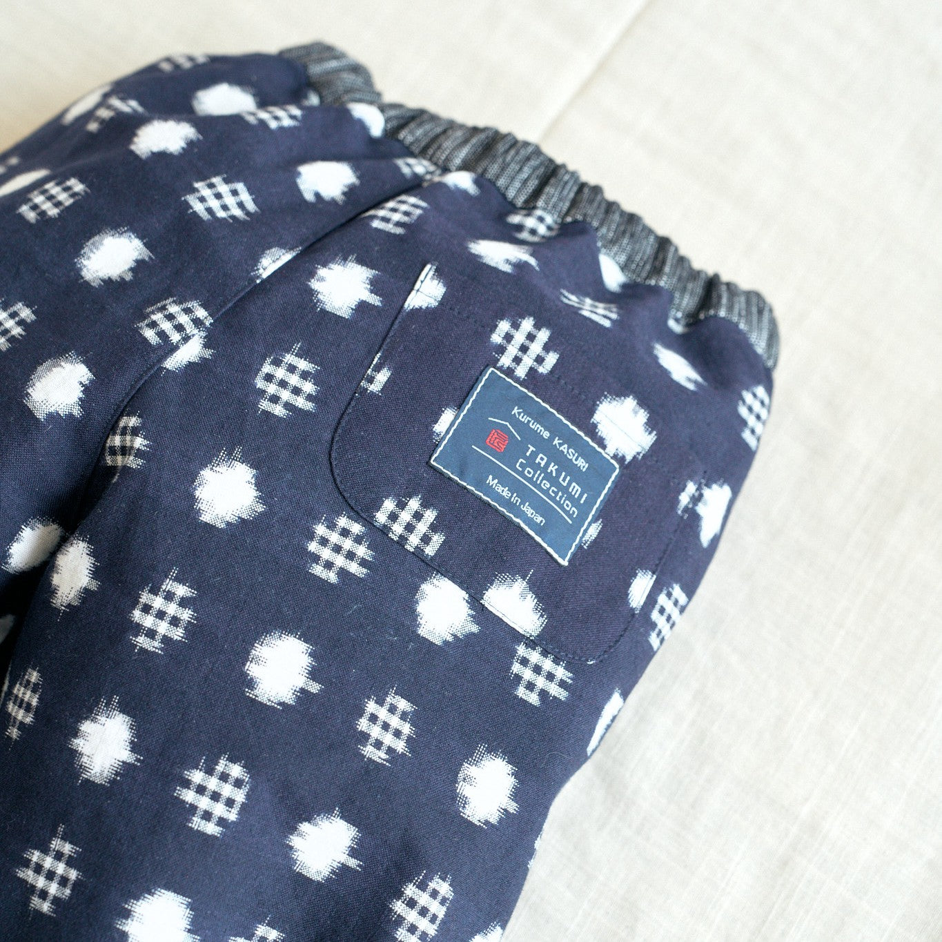 久留米絣 子供用 | もんぺっぺ スタイチーフ | 紺水玉格子 | TAKUMI Collection