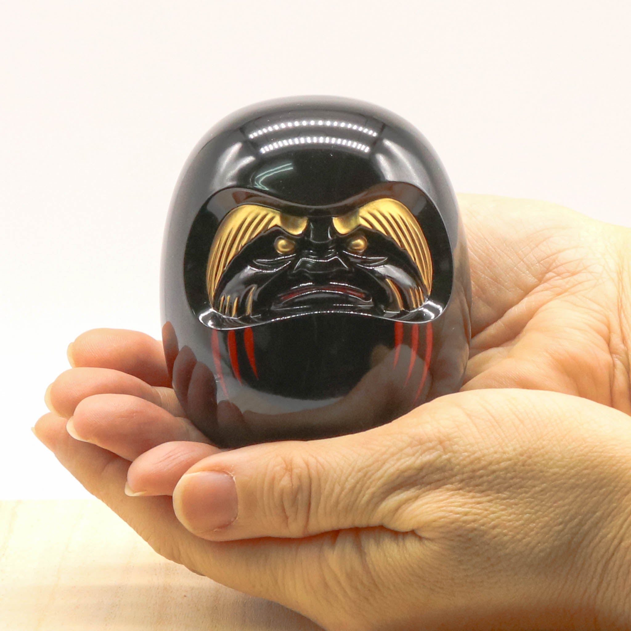 高岡銅器 | 達磨 | 黒漆・金蒔絵仕上げ | 銀雅堂